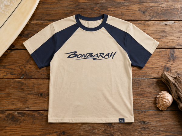 Breakwater Raglan Tee worn on beach