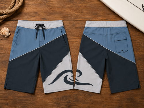 Crosscurrent Board Shorts front and back flat lay on wooden surface